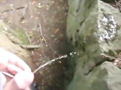 Me pissing outdoors in public with teen foreskin dick