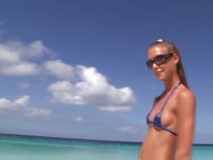 Thin teen brunette in daring micro bikini